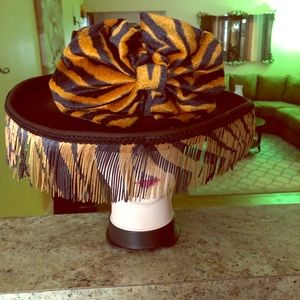 Women brown had with leopard design